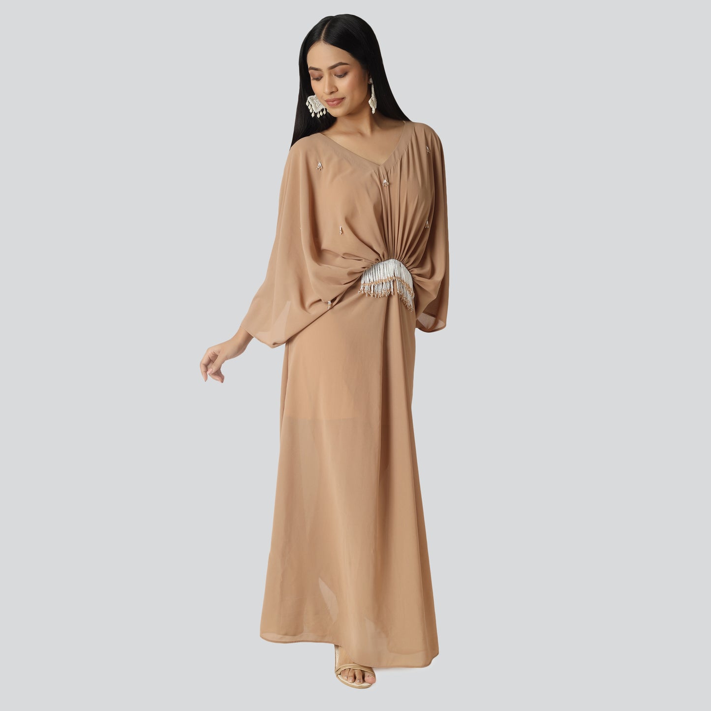 Woman in attitude wearing Indo Western dress