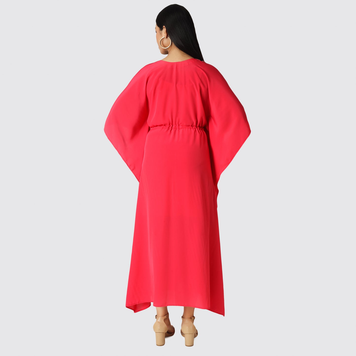 Backside of red dress wearing lady
