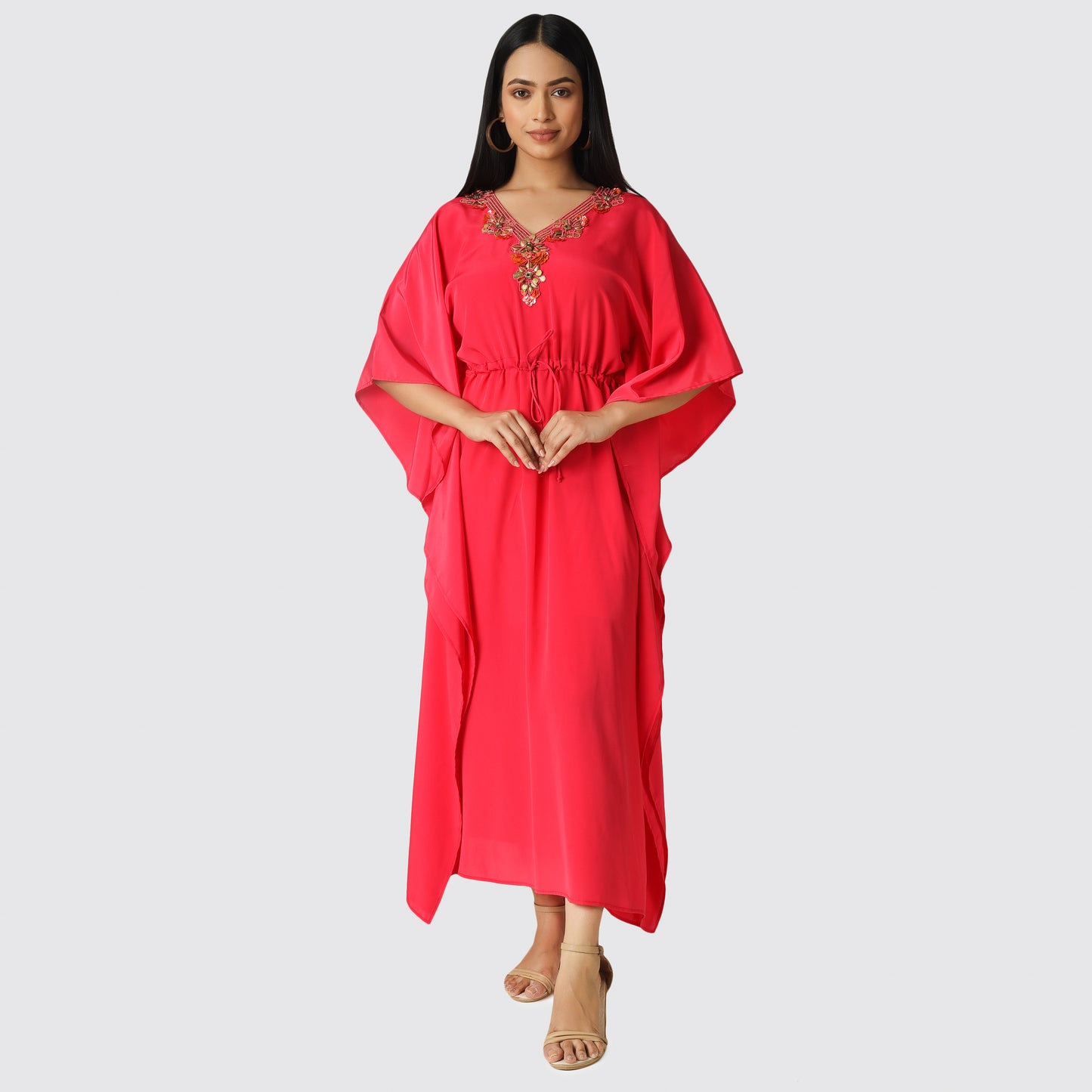 Woman wearing red color kaftan dress