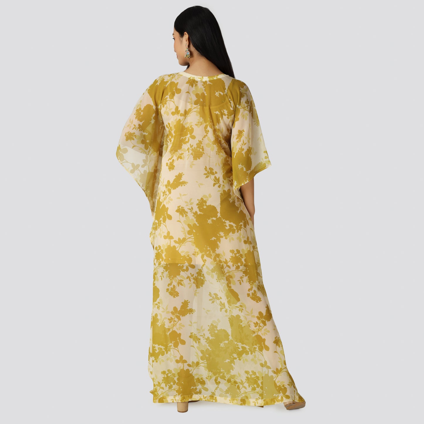 Long yellow dress wearing Indian lady
