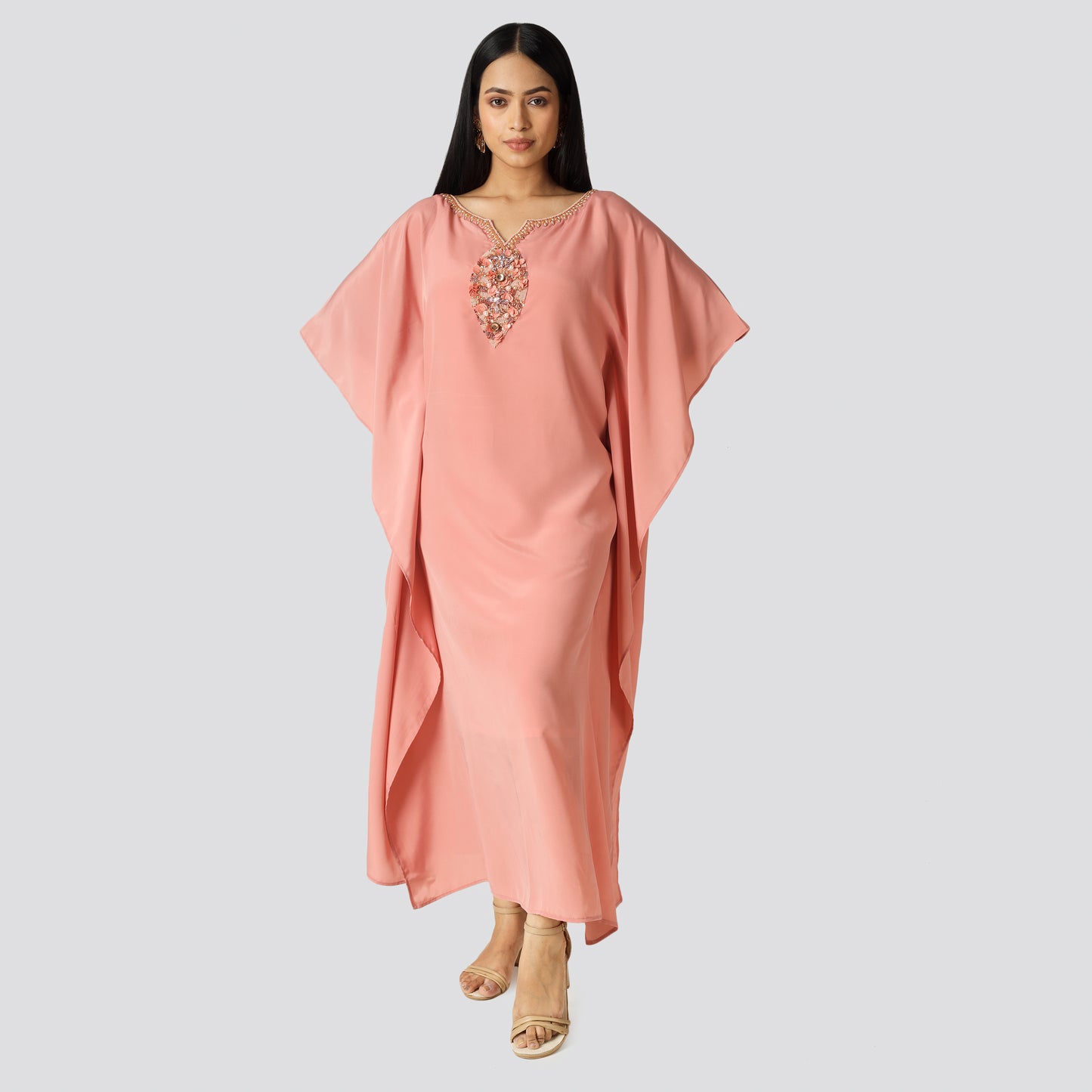 Woman in pink color dress