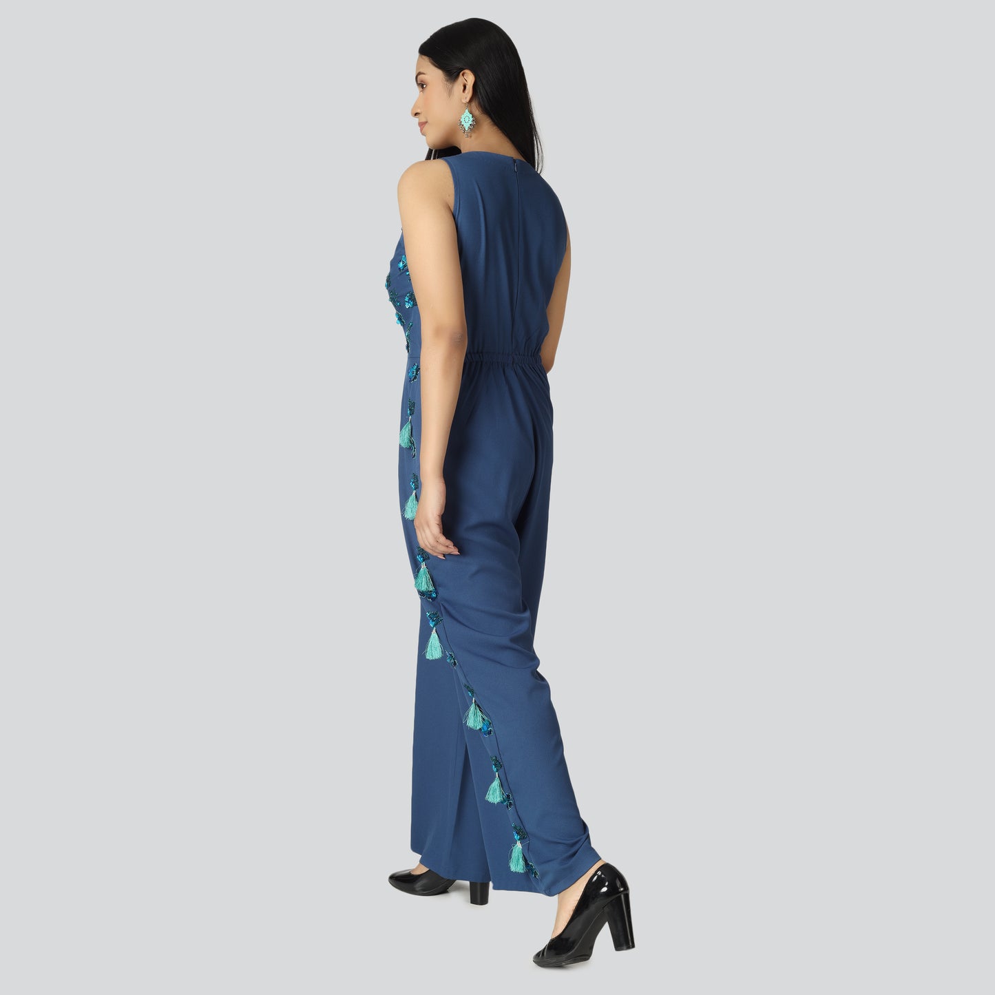 Girl wearing navy blue dress and sandals