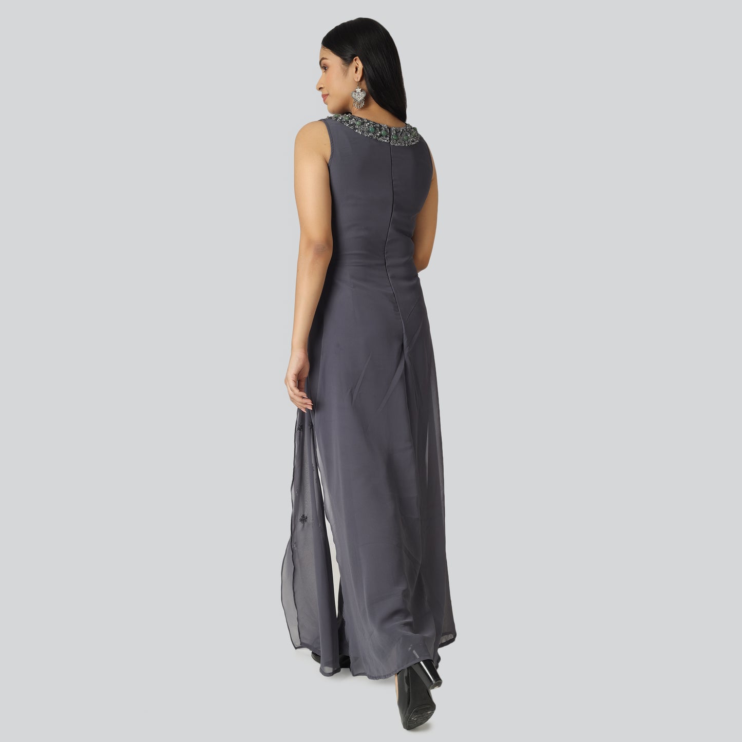Slive less jumpsuit wearing lady