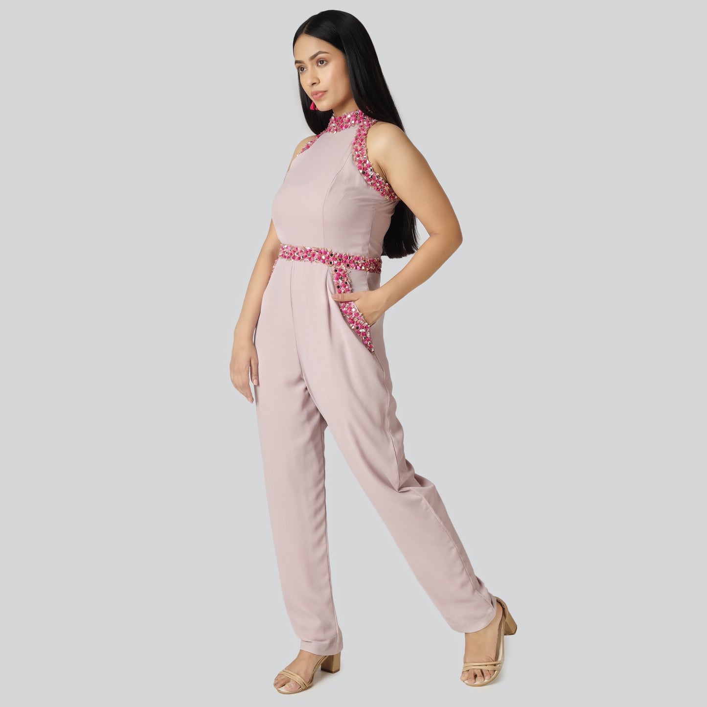 Girl in pink jumpsuit dress