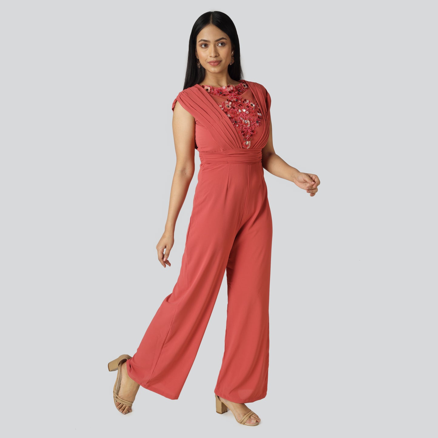 Semi orange color clothes wearing lady