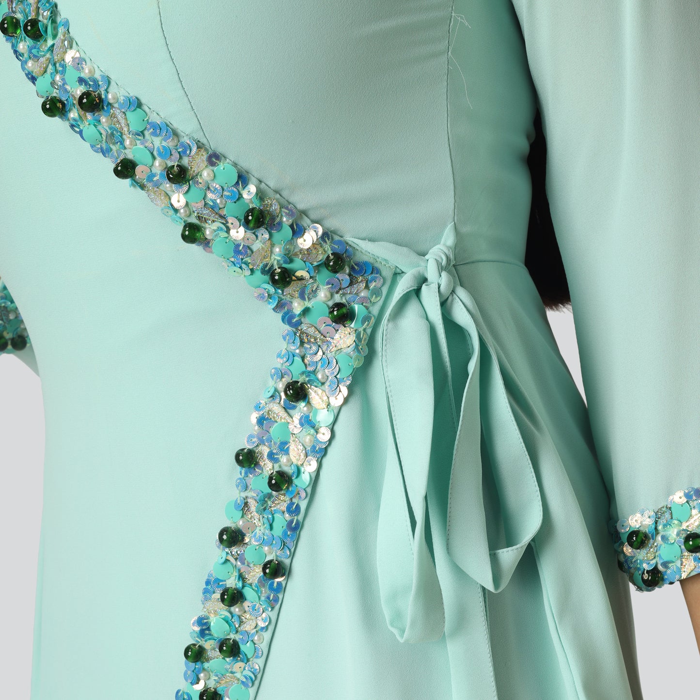 Sea green achkan style suit with belt close side look
