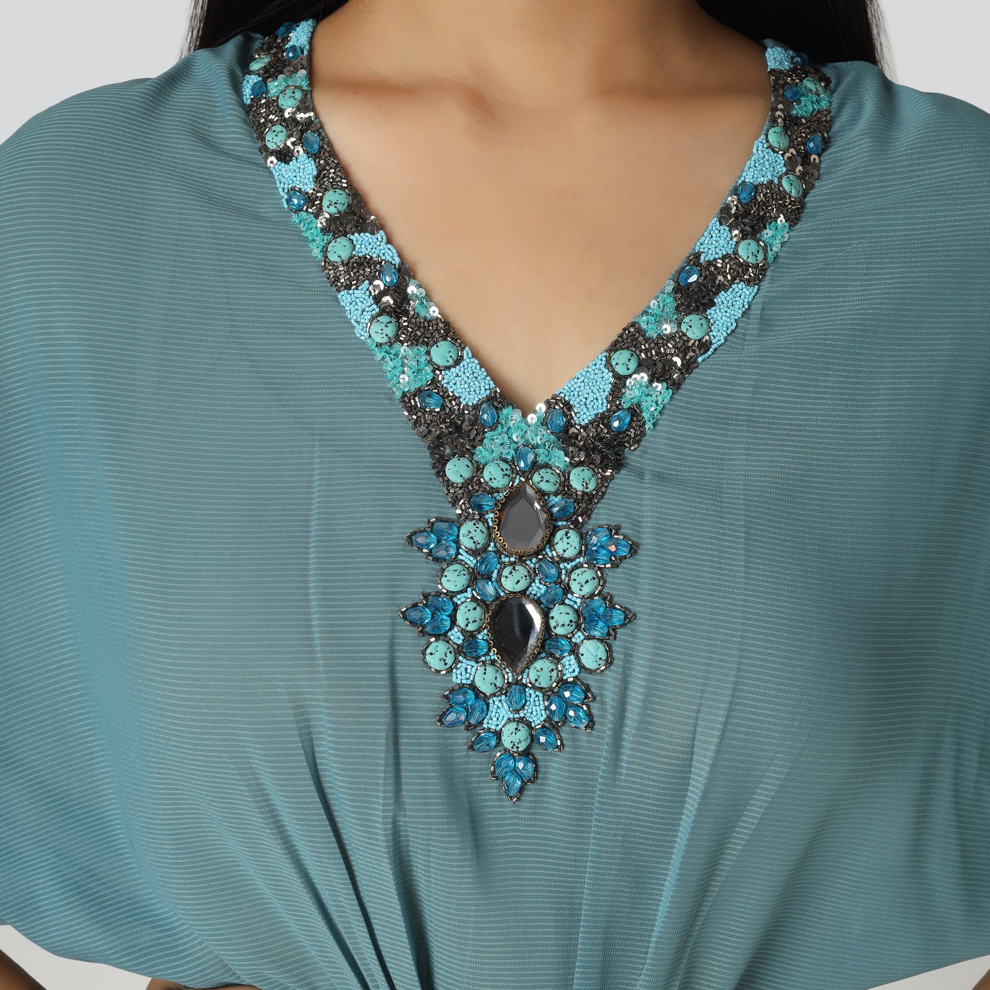 Embroidered neckline dress close look