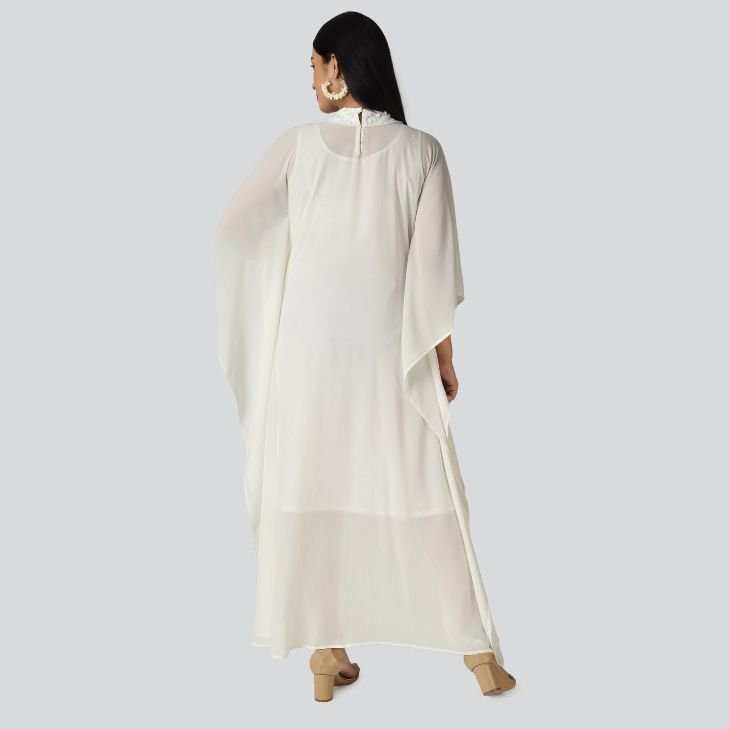 Off white long dress wearing lady