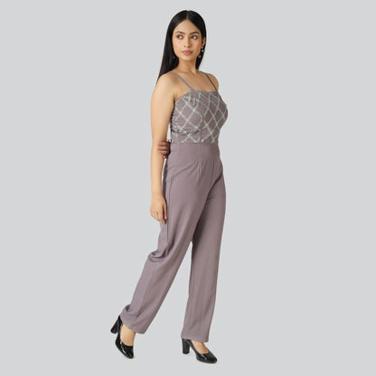 Lady in greyish indo western dress 