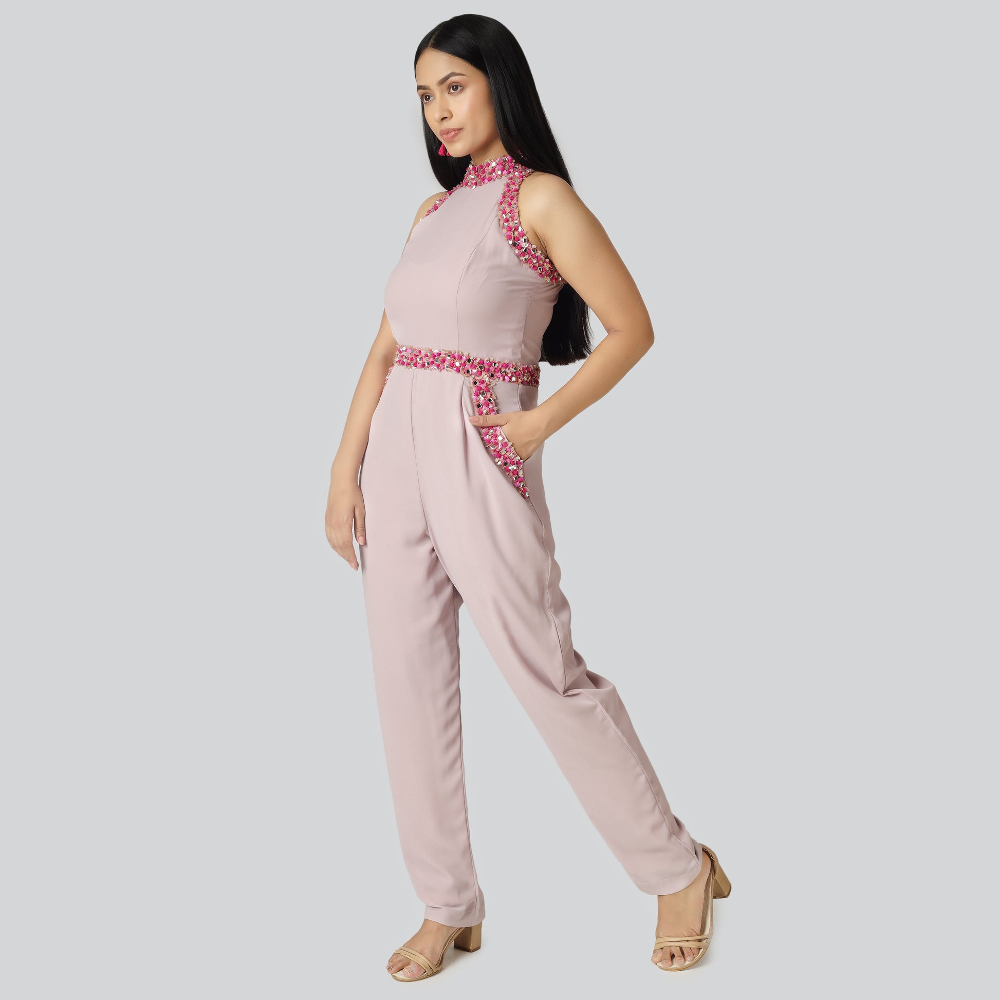 Girl in pink jumpsuit dress