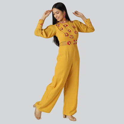 A smiling girl wearing mustard clothes 
