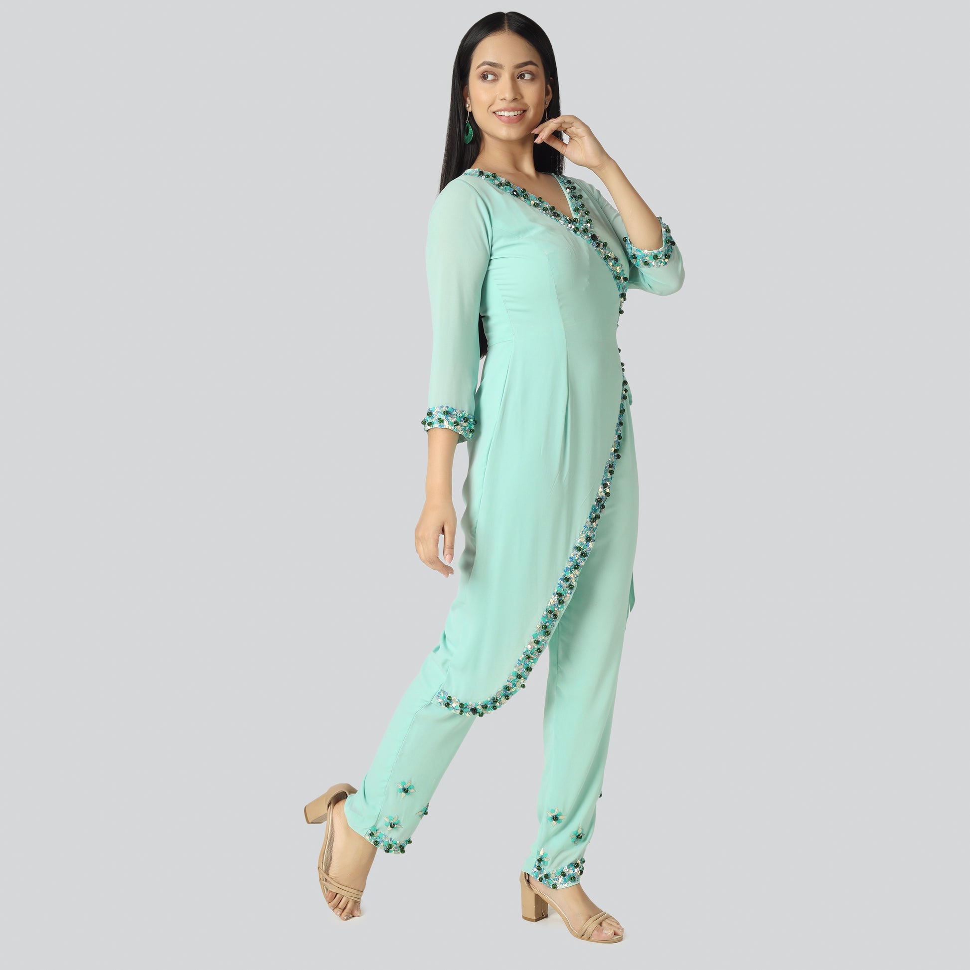 Smiling girl in green suit