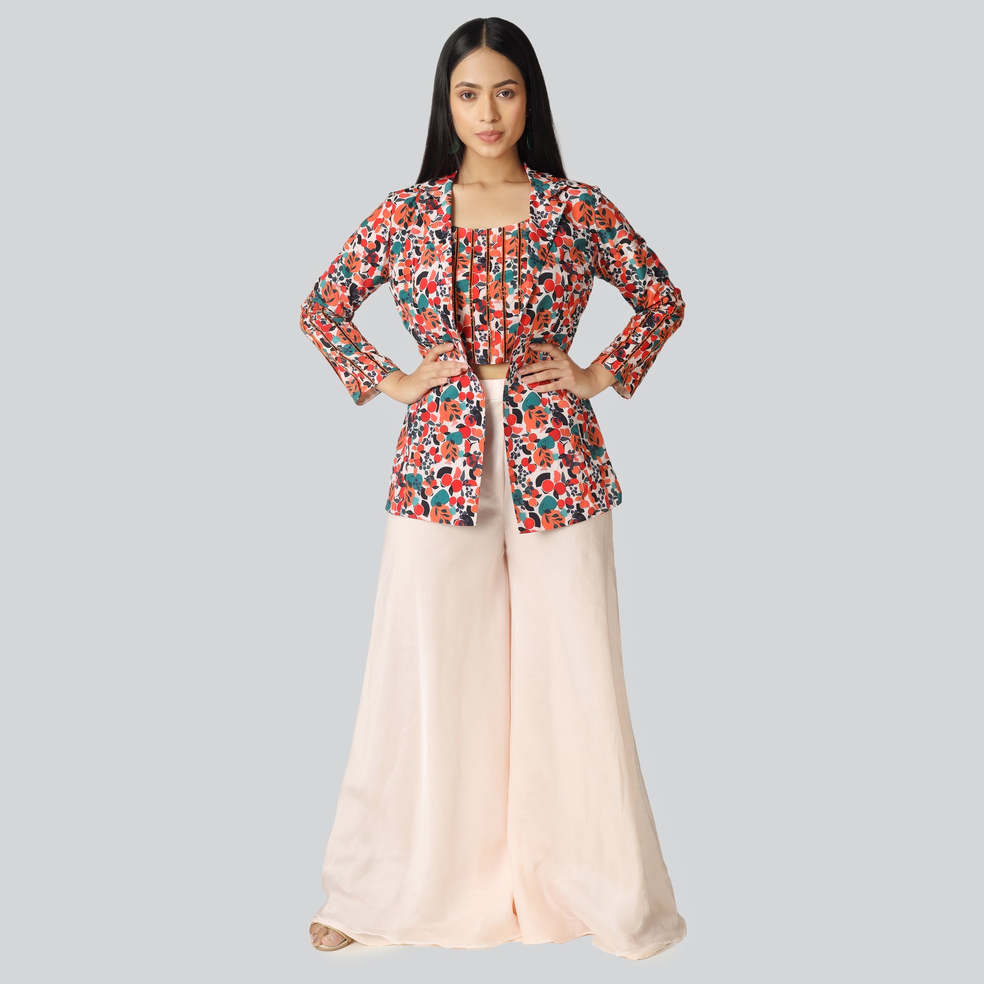 Asian girl wearing printed blazer with creamy plazzo