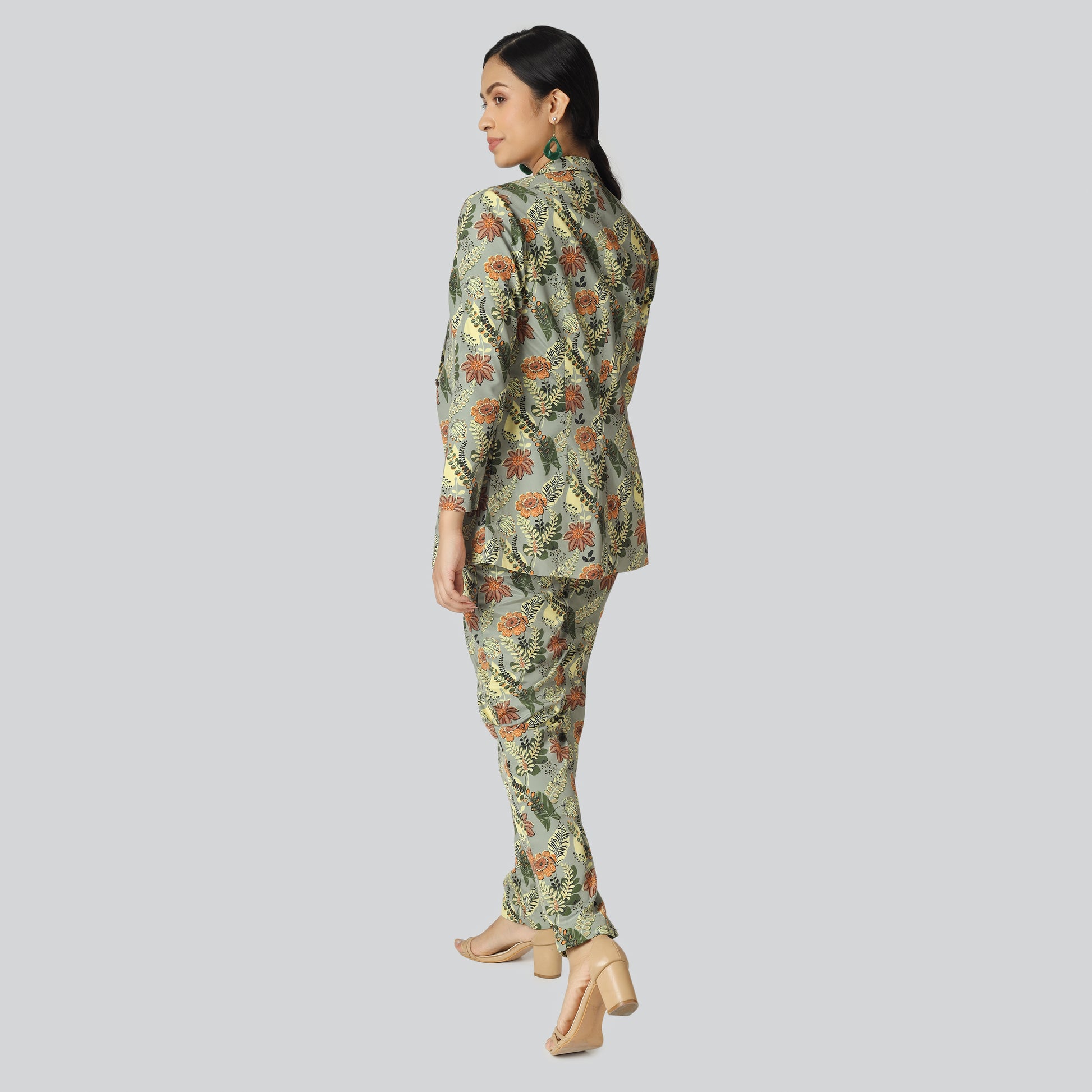 Dynamic printed pant suit wearing girl side look