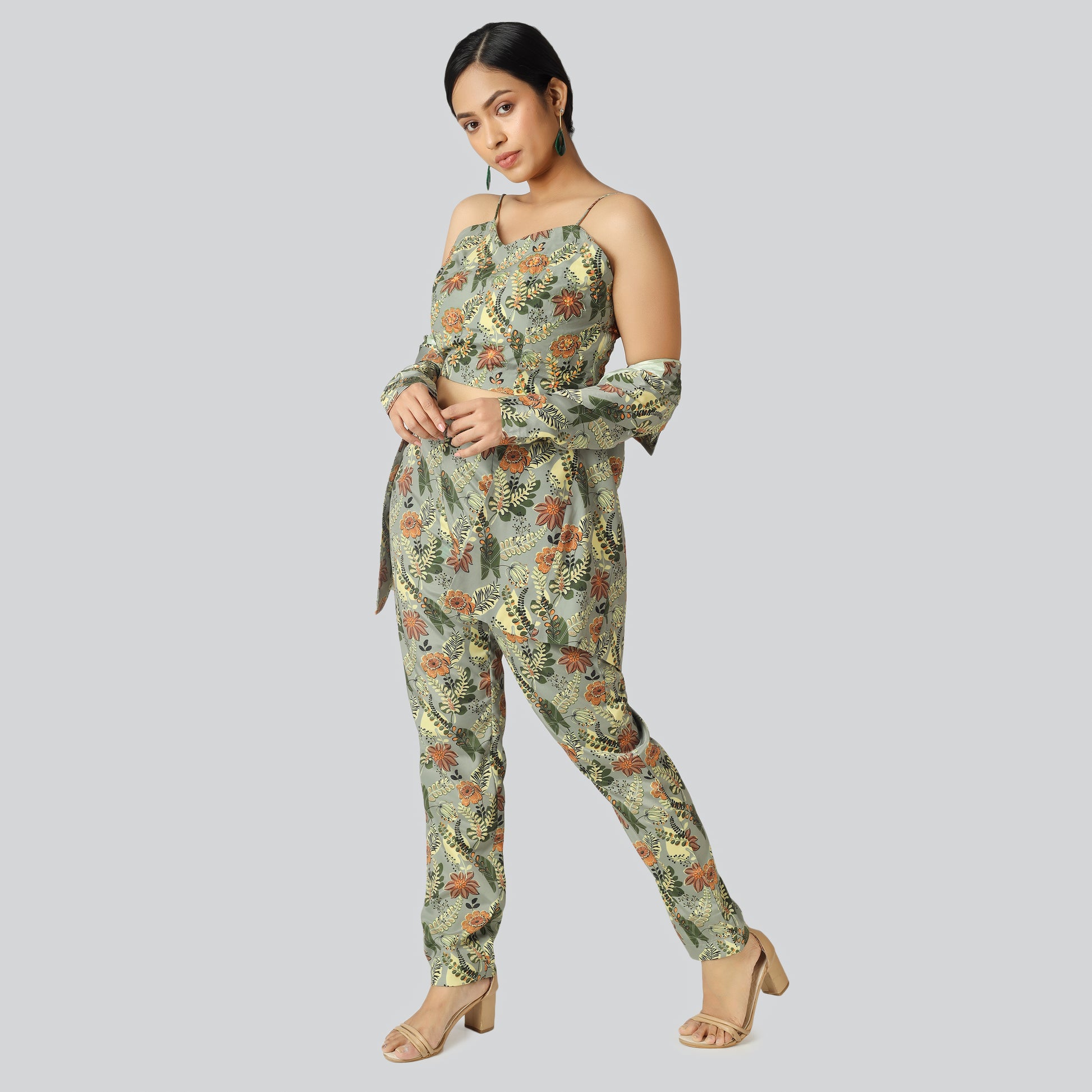 Girl wearing slive less printed pant suit
